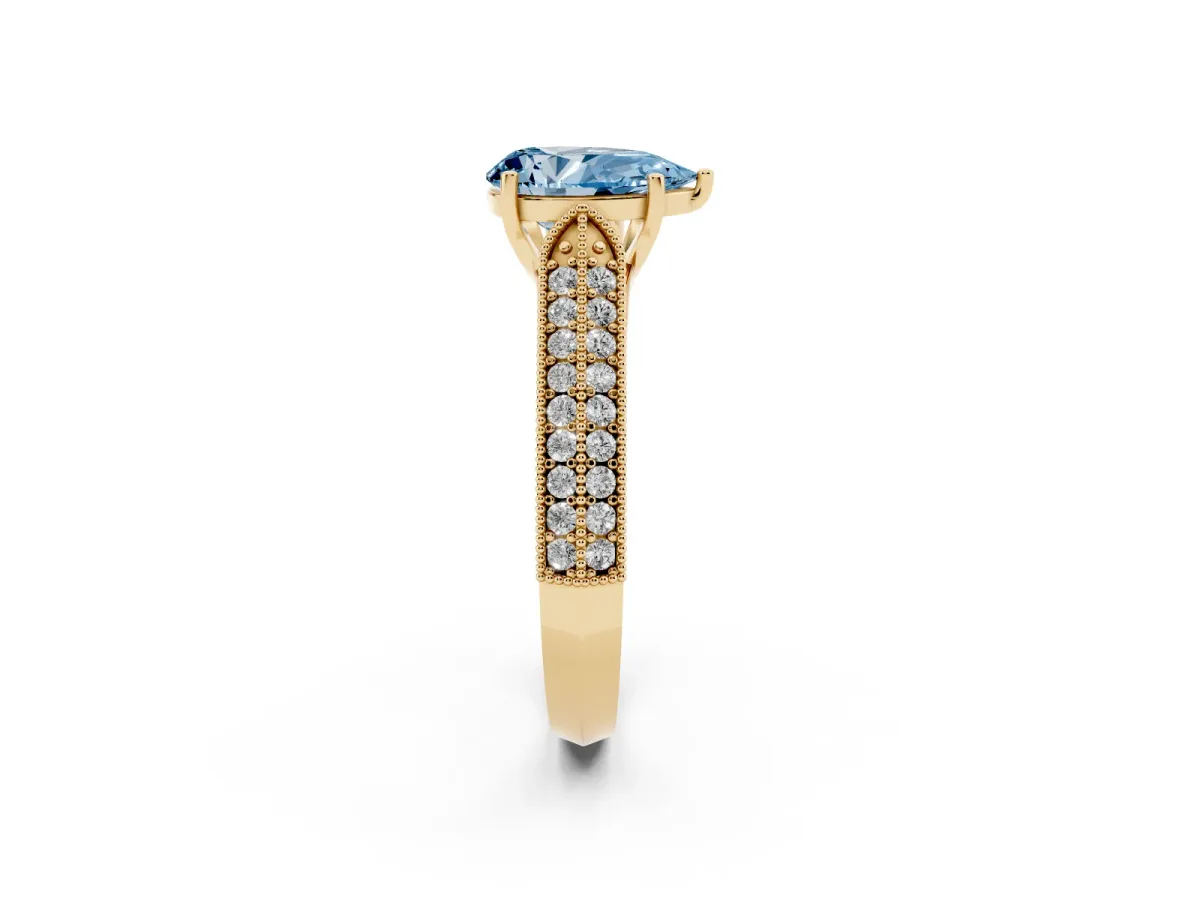 Fancy Blue Pear Cut Cut Pave Split Shank Engagement Ring with Four-Prong Setting Yellow gold