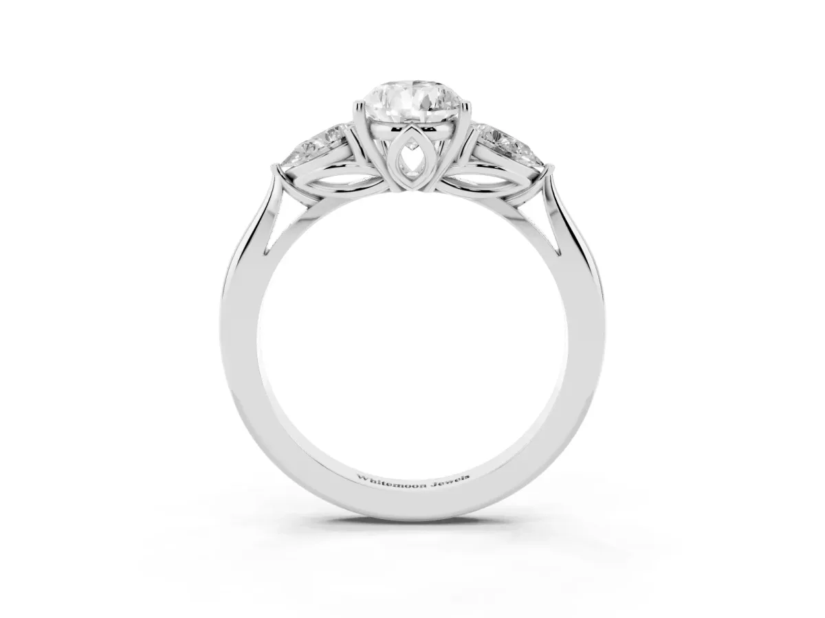 Three-Stone Pear Cut Diamond Ring with Pear Side Stones in Four-Prong Setting Silver