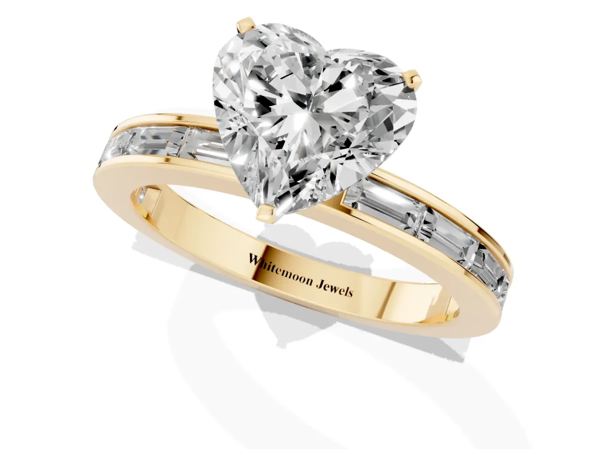 Heart Cut Solitaire Diamond Ring with Channel-Set Baguette Band and Four-Prong Setting Yellow gold