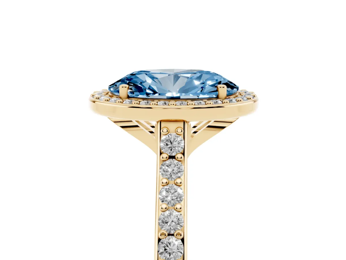 Fancy Blue Oval Cut Diamond Halo Engagement Ring with Round Pavé Shoulders and Prong Setting Yellow gold