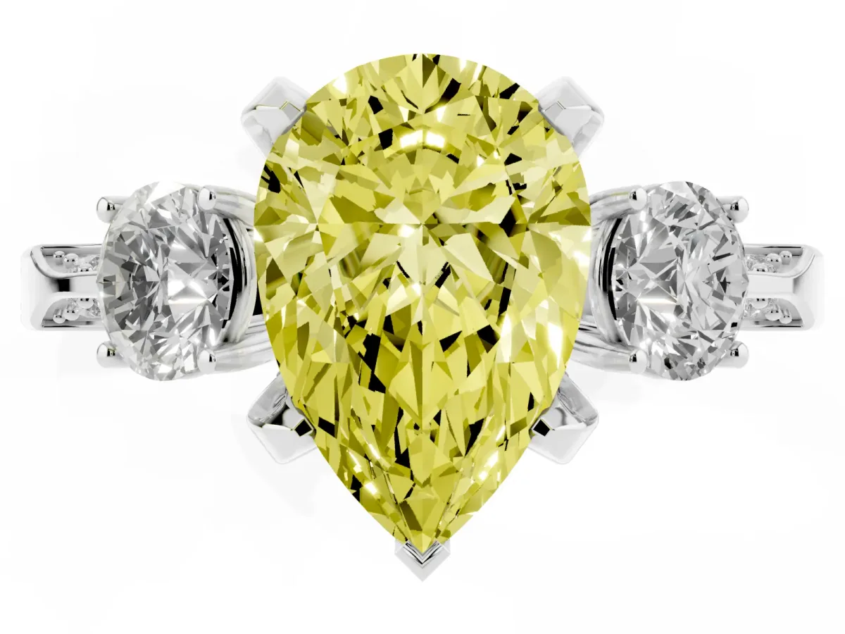 Fancy Yellow Pear Cut Brilliant Three-Stone Diamond Ring with Pavé Band and Four-Prong Setting Platinum