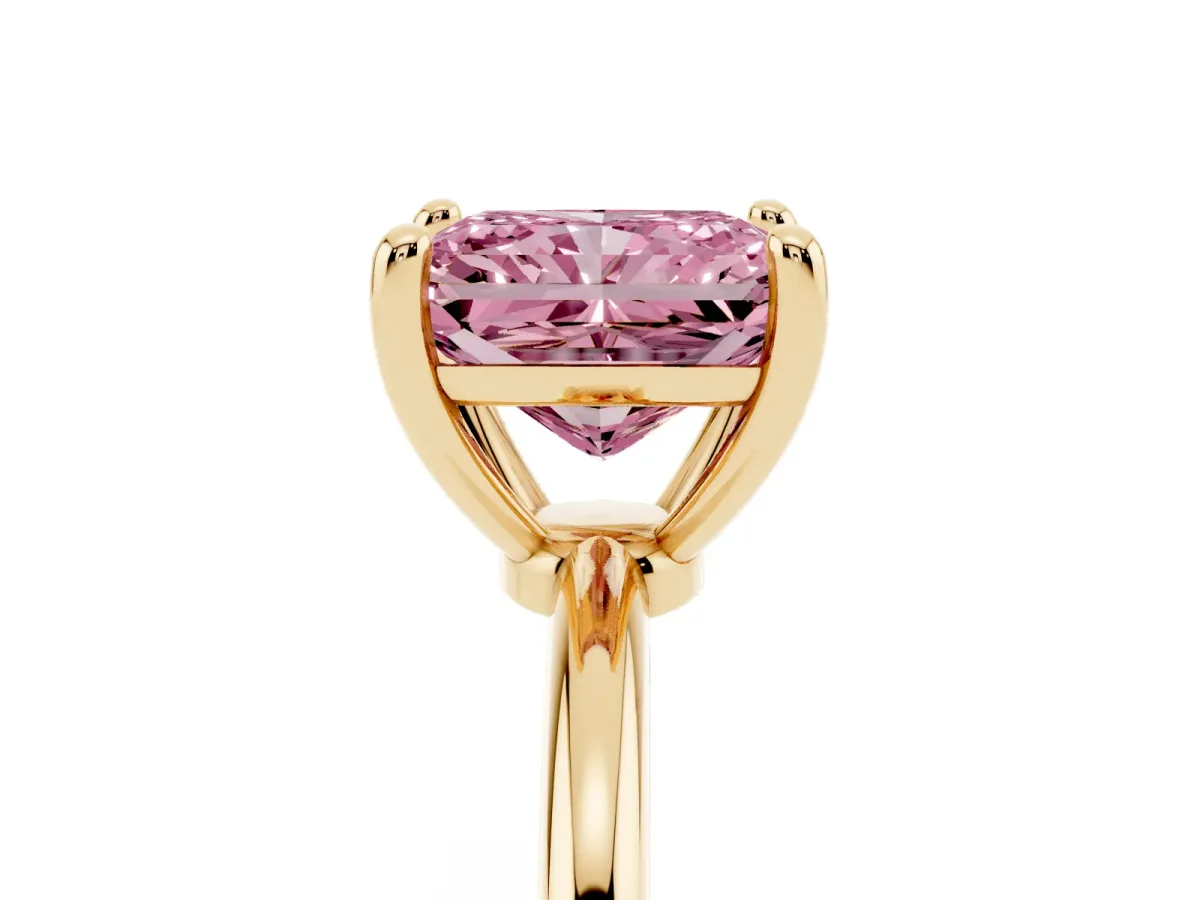 Fancy Pink Radiant Cut Solitaire Diamond Ring with 4-Prong Setting on a Classic Band Yellow gold