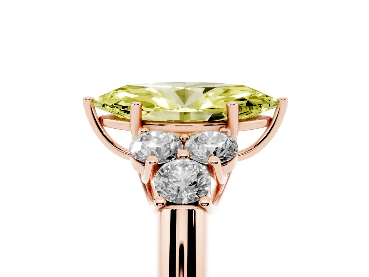 Fancy Yellow Marquise Cut Cut Diamond Cluster Ring with Round Accent Stones and Prong Setting on a Classic Band Rose gold