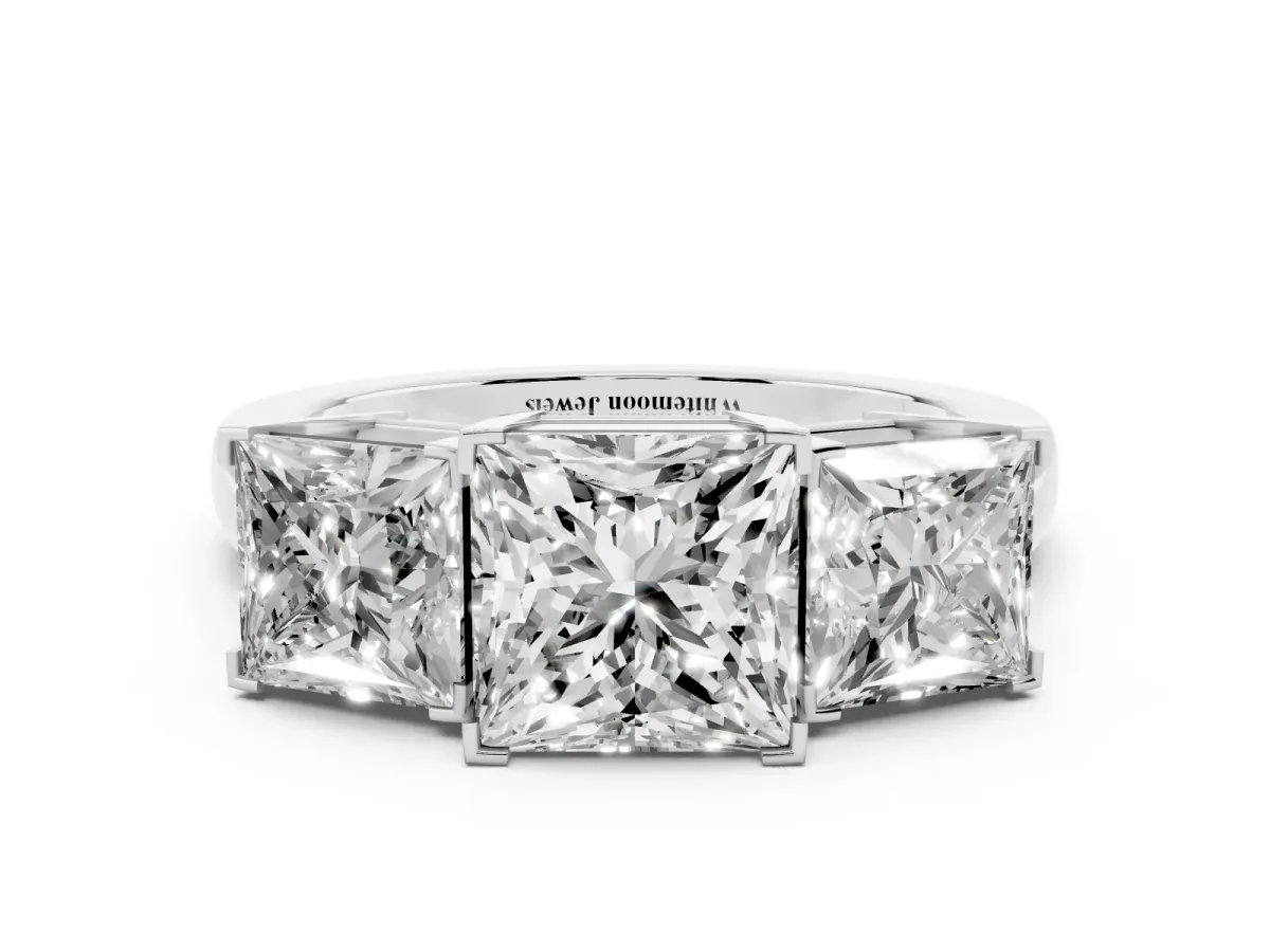 Three-Stone Princess Cut Cut Diamond Ring with Channel Set Band and Four-Prong Setting Silver