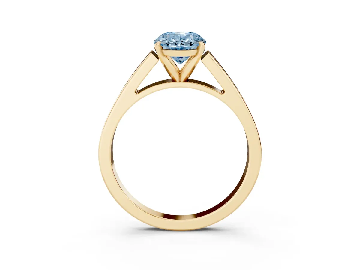Fancy Blue Oval Cut Solitaire Engagement Ring with Four-Prong Setting and Tapered Band Yellow gold