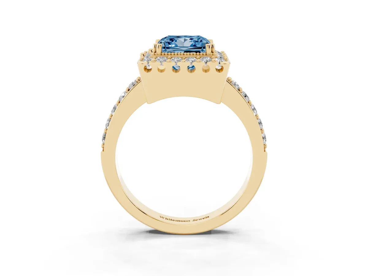 Fancy Blue Princess Cut Diamond Halo Ring with Pavé Band and Prong Setting Yellow gold