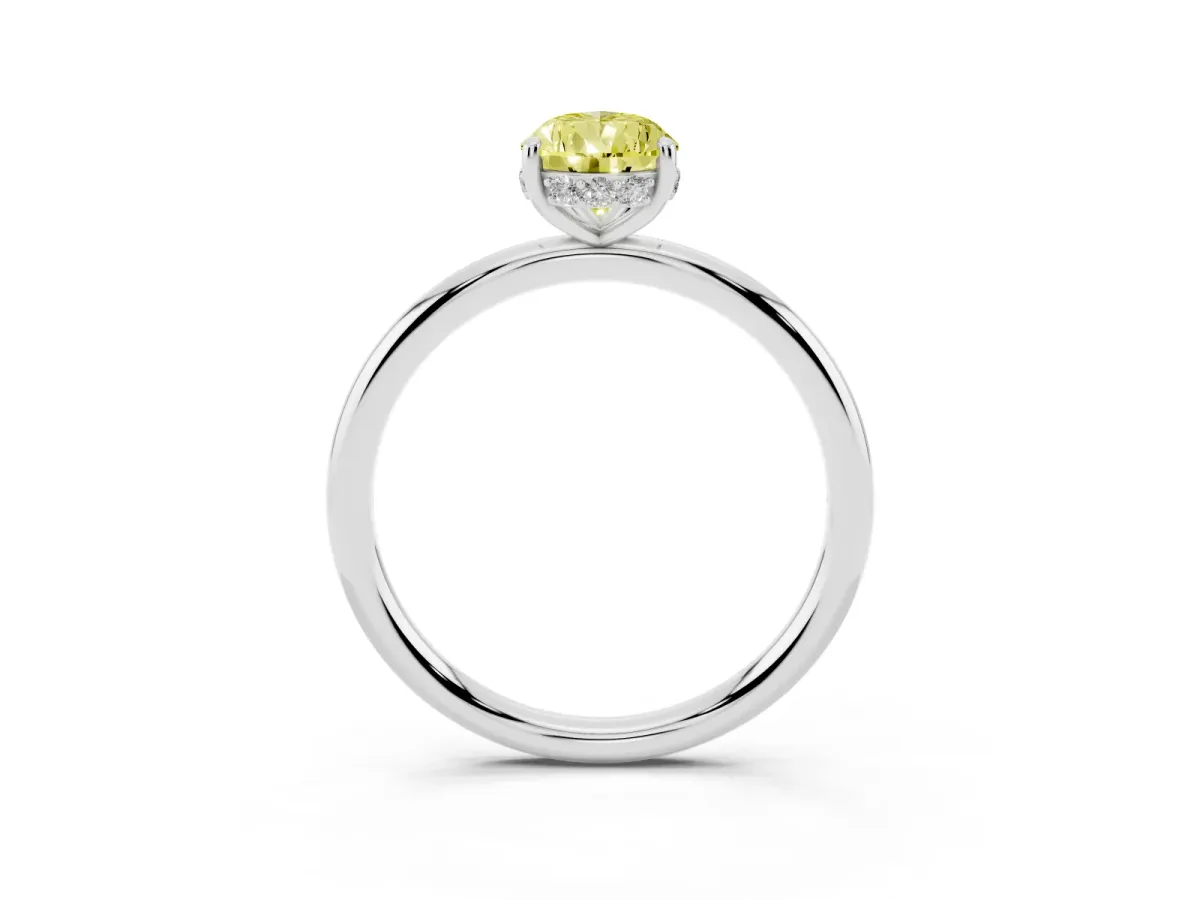 Fancy Yellow Pear Cut Solitaire Diamond Ring with a Classic Band and Four-Prong Setting Silver