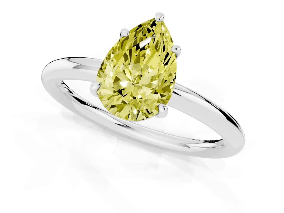 Fancy Yellow Pear Cut Solitaire Diamond Ring with Four-Prong Setting on a Plain Band White gold