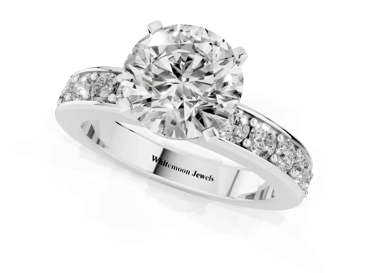 Round Cut Diamond Engagement Ring with Channel Set Round Band and Prong Setting Silver