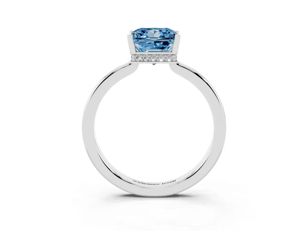 Fancy Blue Princess Cut Cut Solitaire Engagement Ring with Four-Prong Setting on a Classic Band Silver