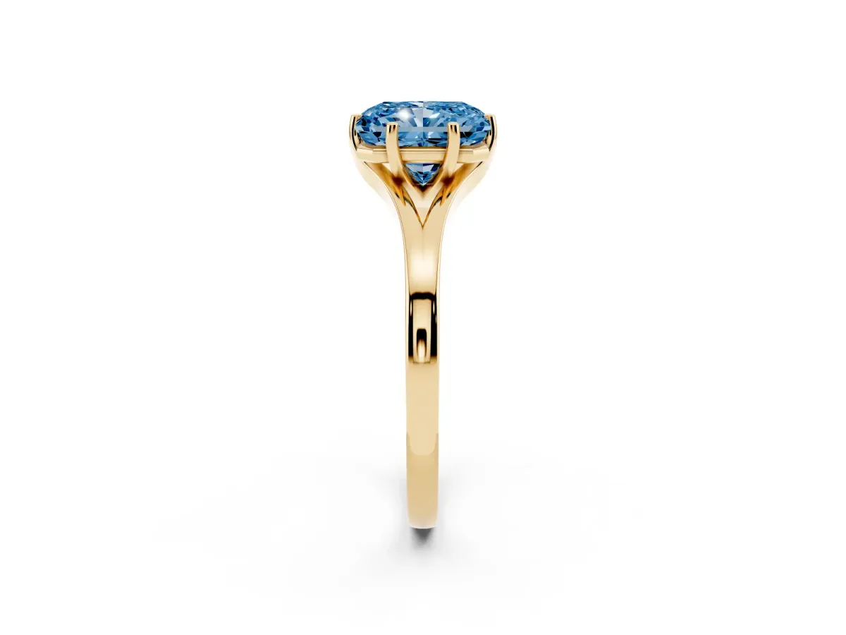 Fancy Blue Radiant Cut Solitaire Diamond Ring with Six-Prong Setting and Tapered Band Yellow gold