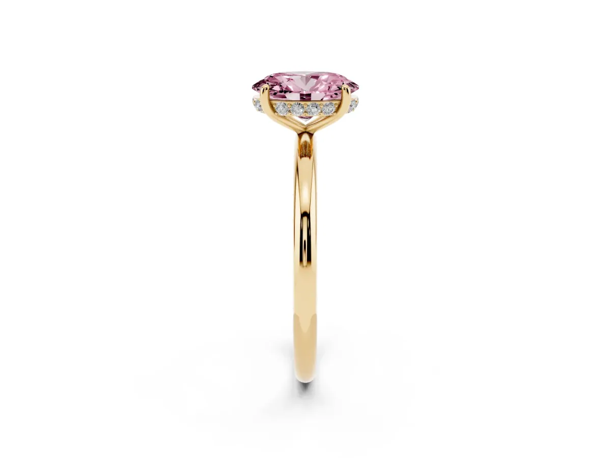 Fancy Pink Oval Cut Solitaire Diamond Ring with a Classic Band and Four-Prong Setting Yellow gold