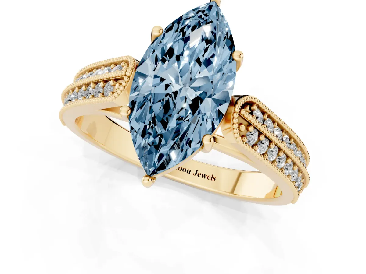 Fancy Blue Marquise Cut Cut Pave Split Shank Engagement Ring with Four-Prong Setting Yellow gold