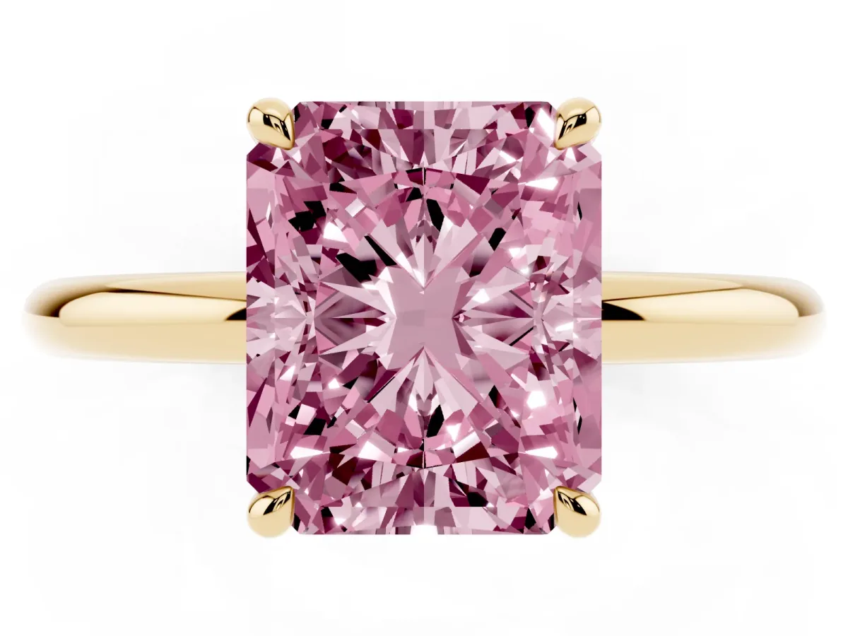 Fancy Pink Radiant Cut Diamond Solitaire Ring with Thin Band and Four-Prong Setting Yellow gold