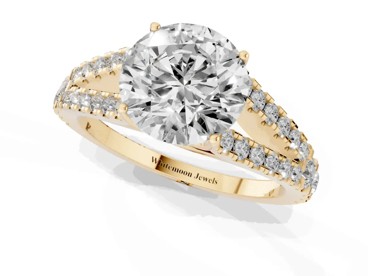 Round Cut Diamond Split Shank Engagement Ring with Round Pavé and Prong Setting Yellow gold