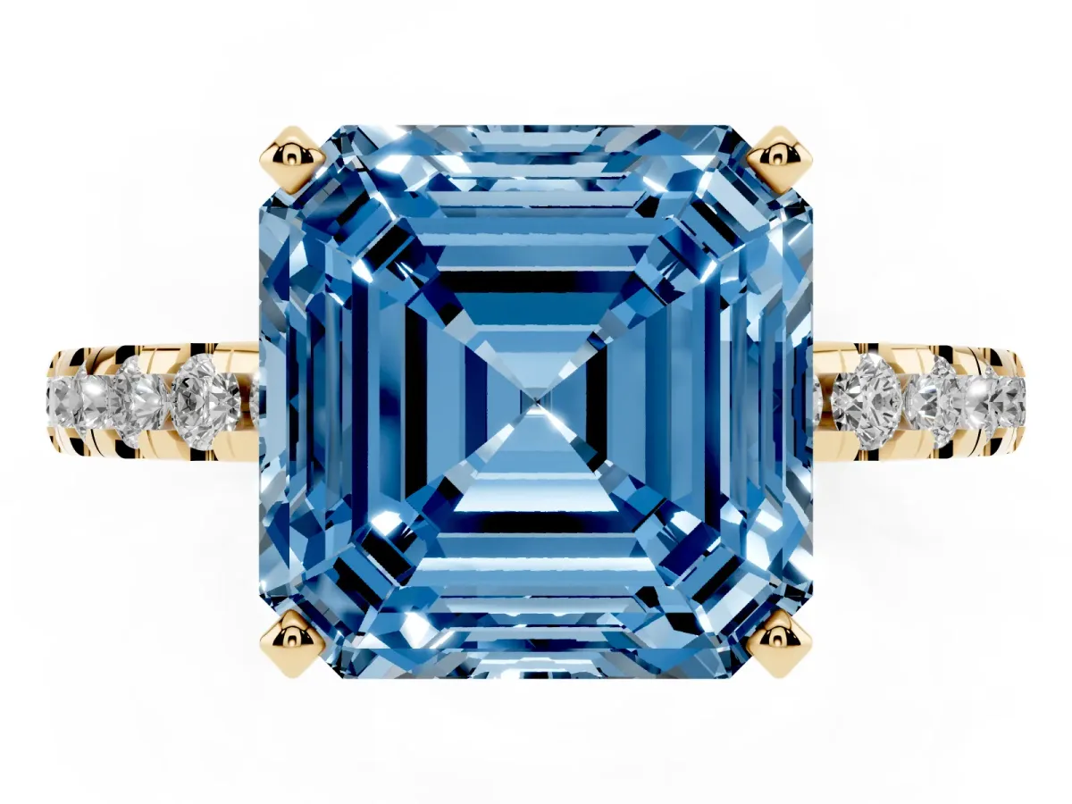 Fancy Blue Asscher Cut Diamond Solitaire Ring with Round Pavé Band and Four-Prong Setting Yellow gold