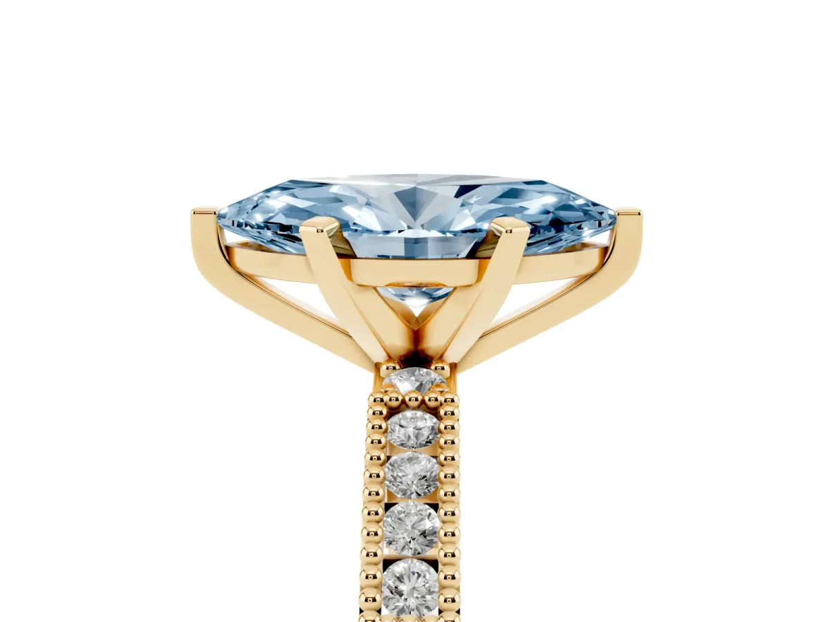 Fancy Blue Marquise Cut Solitaire with Pavé Band and Four-Prong Setting Yellow gold