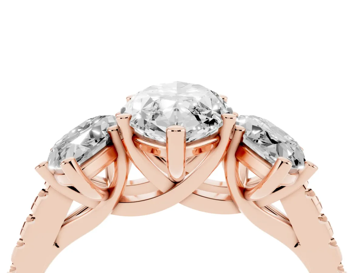 Three-Stone Marquise Cut Diamond Ring with Round Pavé Band and Prong Setting Rose gold