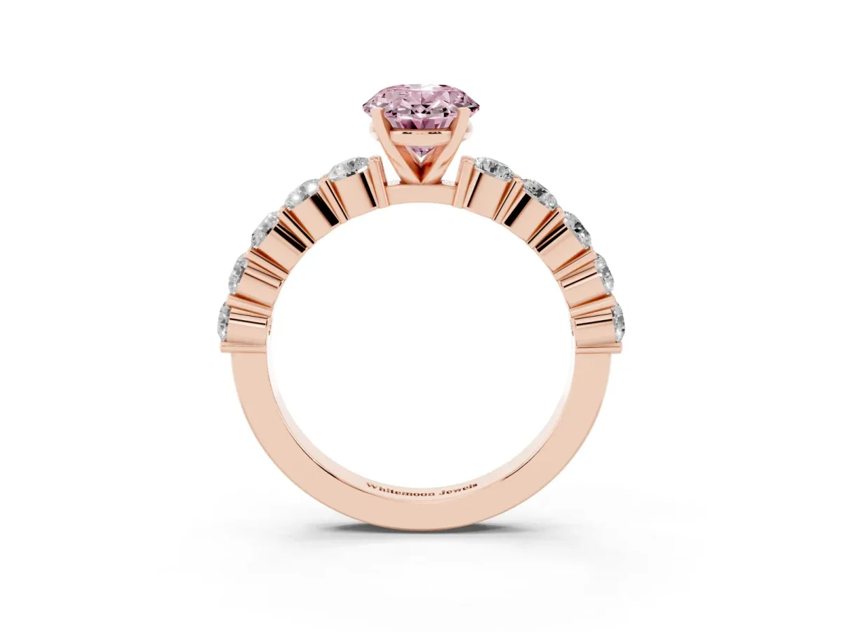 Fancy Pink Oval Cut Diamond Solitaire Ring with Shared Prong Round Side Stones Rose gold