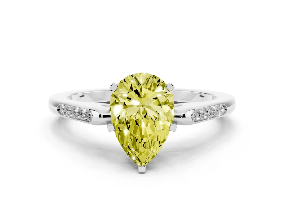 Fancy Yellow Pear Cut Diamond Solitaire Ring with Channel Set Round Band and Prong Setting Silver