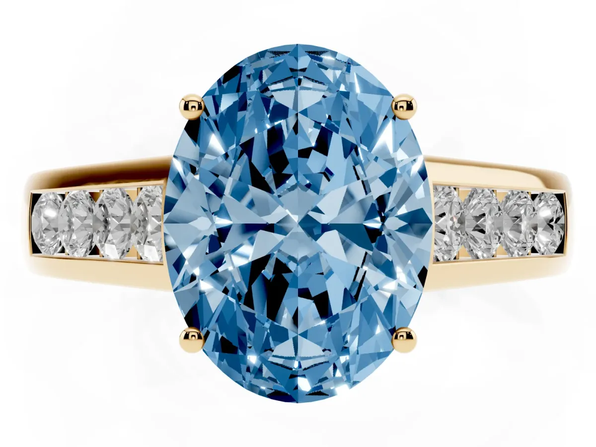 Fancy Blue Oval Cut Brilliant Channel-Set Solitaire Ring with Four-Prong Setting Yellow gold