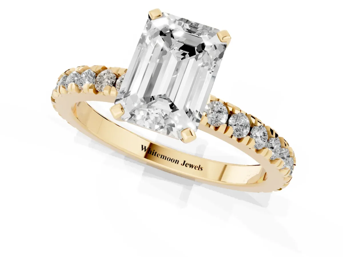 Emerald Cut Diamond Pavé Band Solitaire with Four-Prong Setting Yellow gold