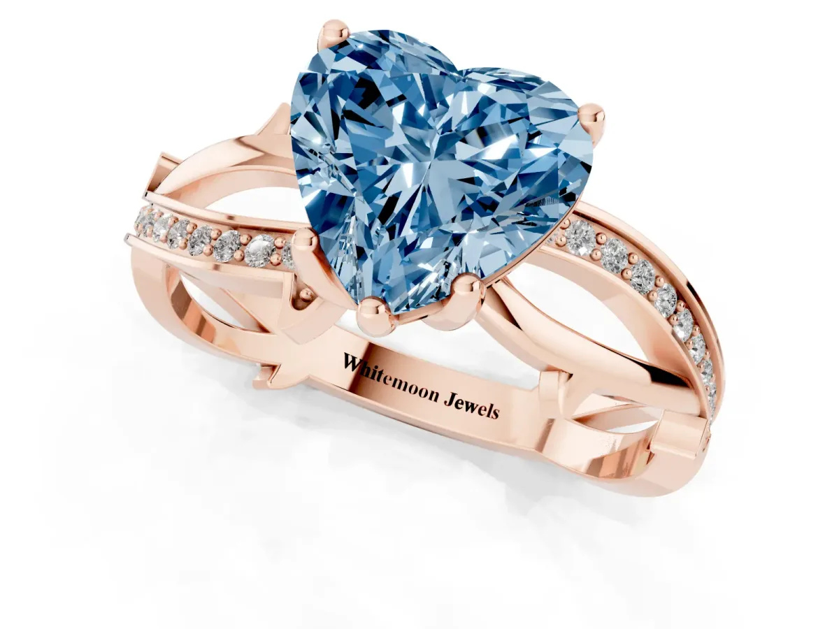 Fancy Blue Heart Cut Solitaire Twist Band with Pavé Accents and Four-Prong Setting Rose gold
