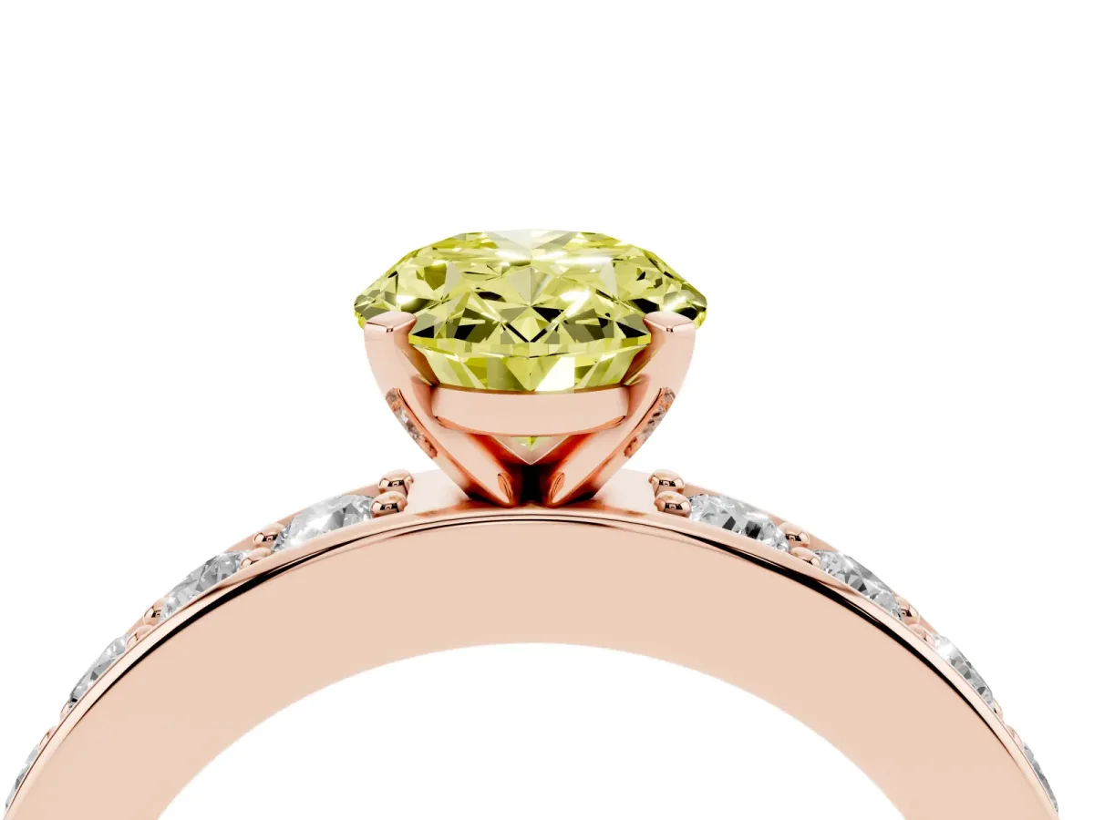 Fancy Yellow Oval Cut Diamond Engagement Ring with Channel Set Round Band and Prong Setting Rose gold