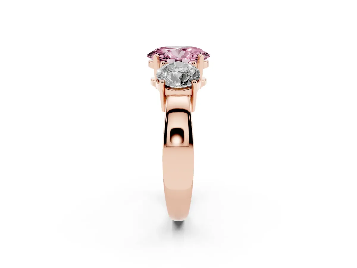 Fancy Pink Three-Stone Oval Cut Diamond Ring with Round Side Stones, Classic Band, and Four-Prong Setting Rose gold