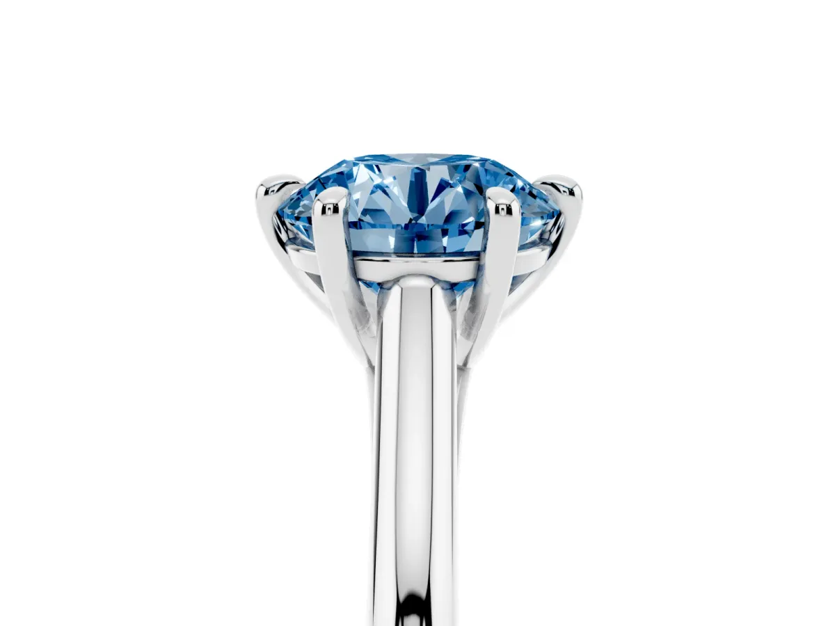 Fancy Blue Round Cut Solitaire Engagement Ring with Six-Prong Setting and Classic Band Silver