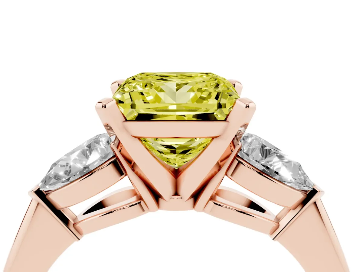 Fancy Yellow Three-Stone Princess Cut Diamond Ring with Pear Side Stones and Four-Prong Setting Rose gold