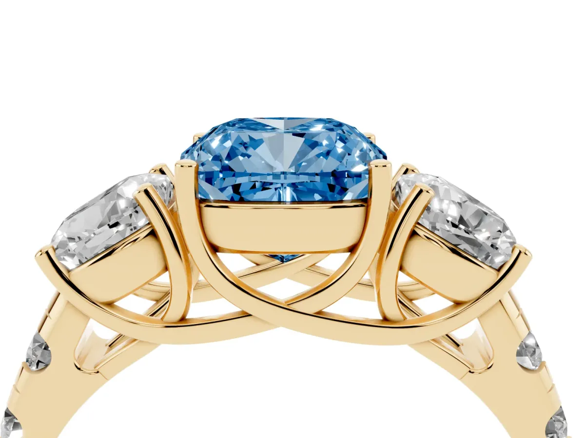 Fancy Blue Three-Stone Cushion Cut Diamond Pavé Band with Prong Setting Yellow gold