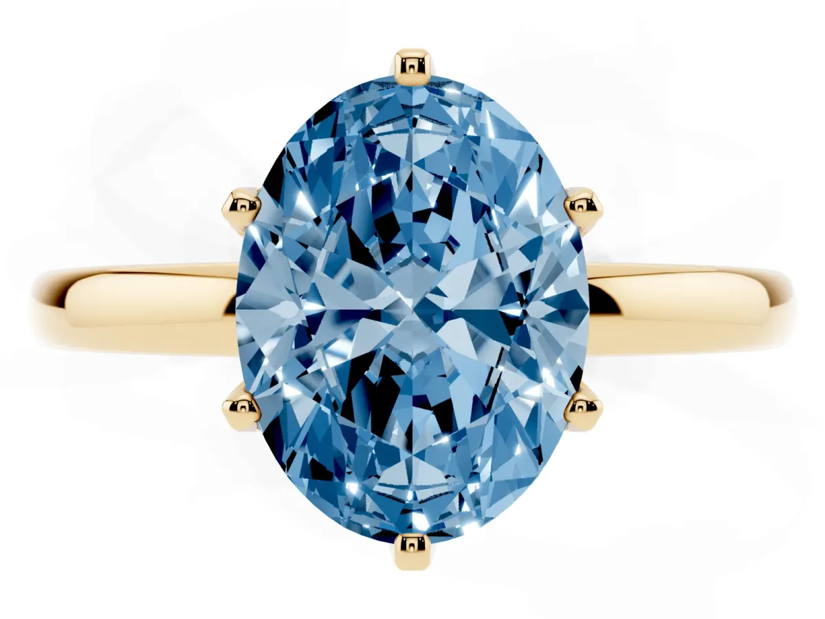 Fancy Blue Oval Cut Solitaire Diamond Ring with Six-Prong Setting on a Classic Band Yellow gold