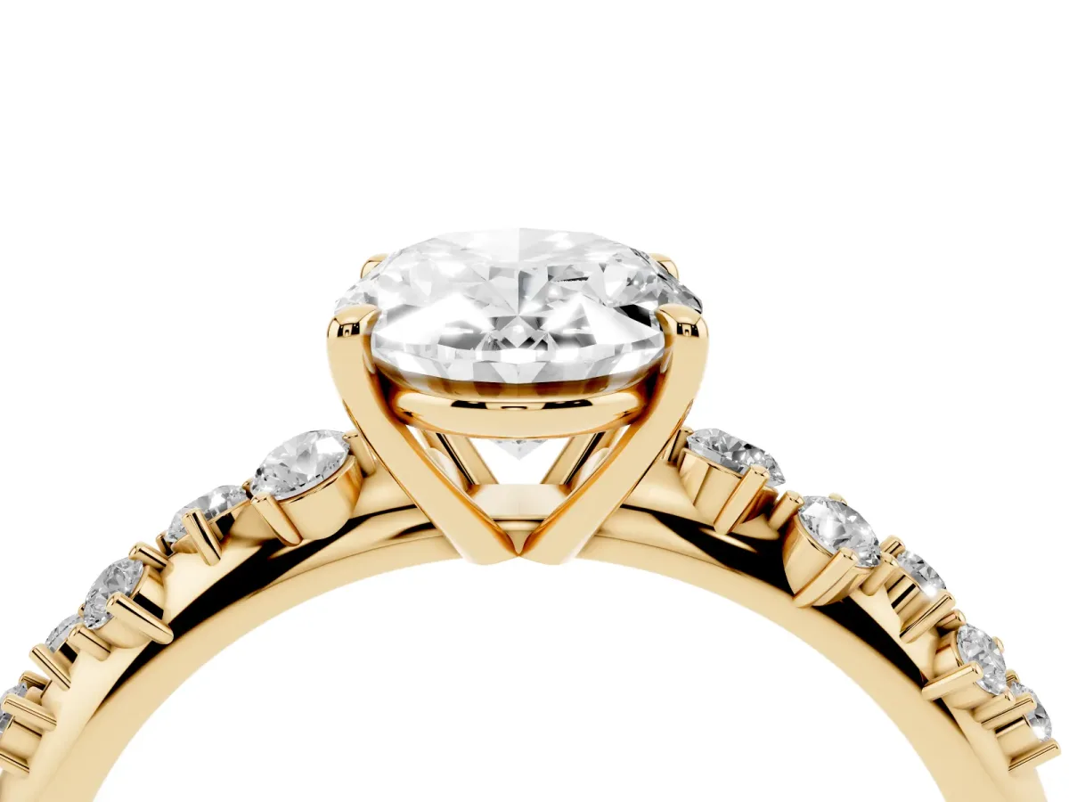 Oval Cut Diamond Cluster Side Stone Solitaire Ring with Prong Setting Yellow gold