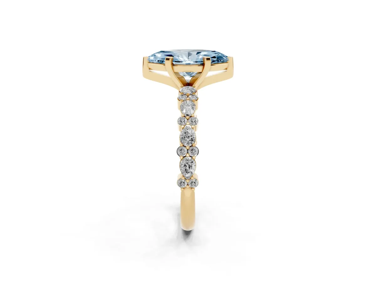 Fancy Blue Marquise Cut Diamond Side Stone Solitaire Ring with Round and Four-Prong Setting Yellow gold
