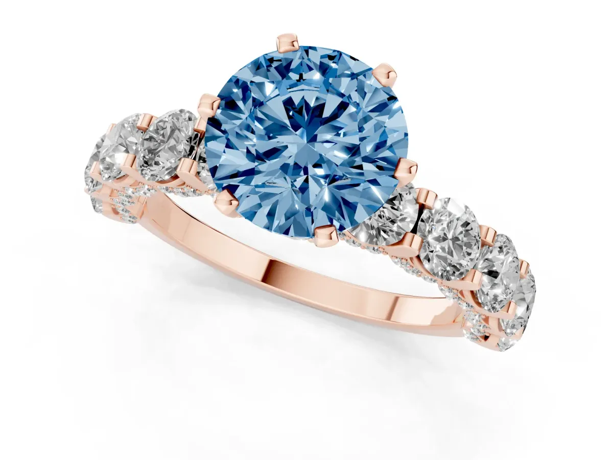 Fancy Blue Round Cut Diamond Side Stone Engagement Ring with Four-Prong Setting Rose gold