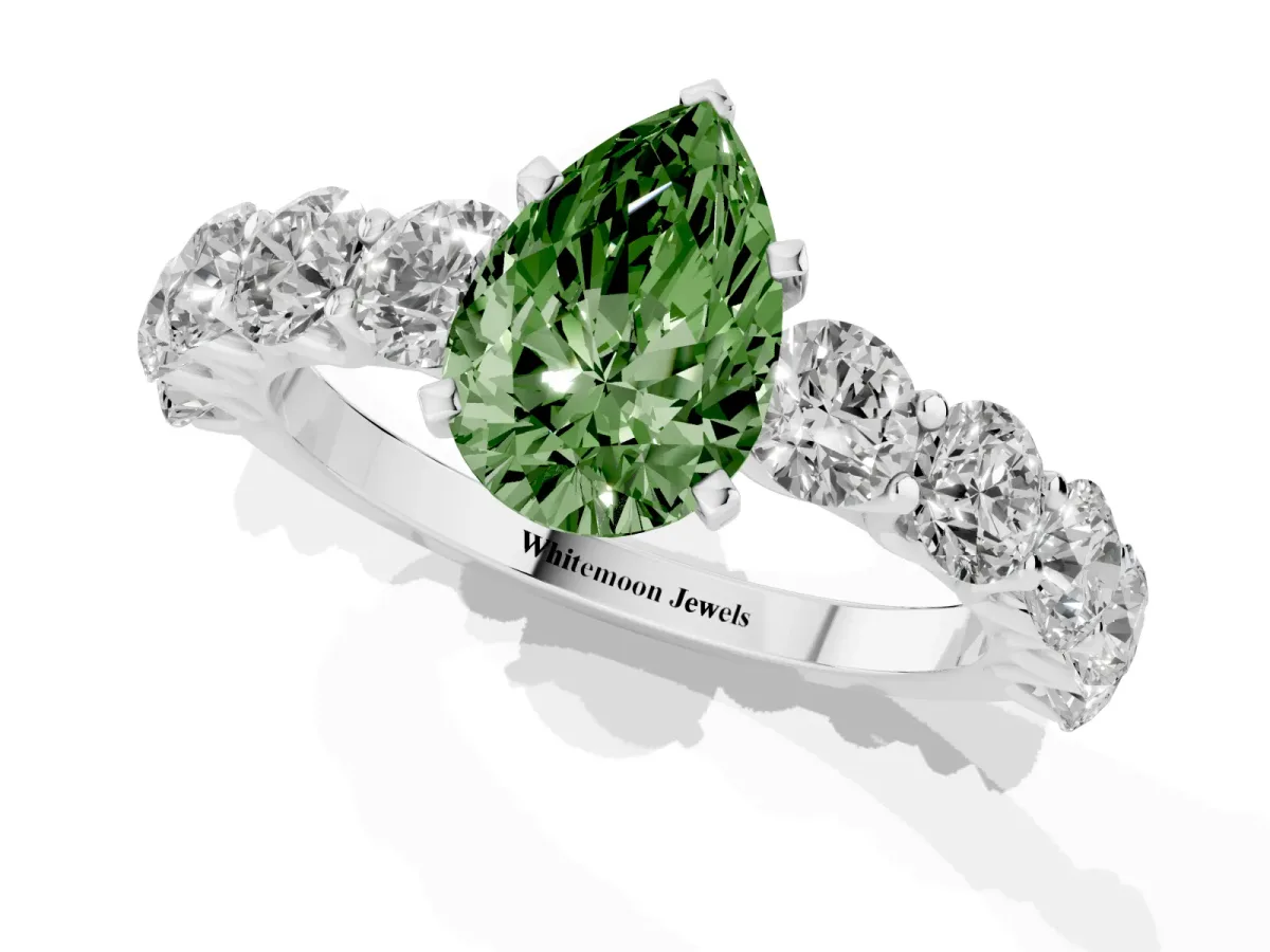 Fancy Green Pear Cut Diamond Prong Setting with Side Stones on a Pave Band Silver