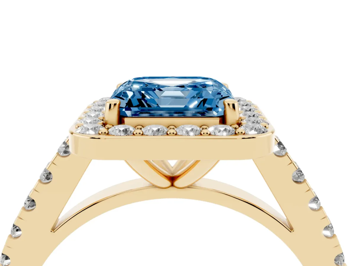 Fancy Blue Asscher Cut Diamond Halo Ring with Round Pavé Split Shank and Prong Setting Yellow gold