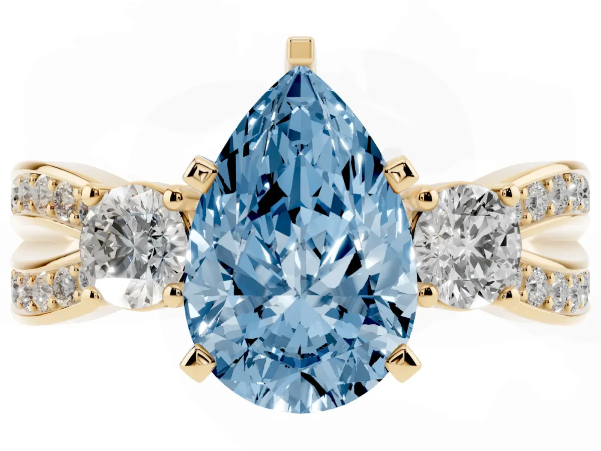 Fancy Blue Three-Stone Pear Cut Cut Diamond Twist Band with Prong Setting Yellow gold