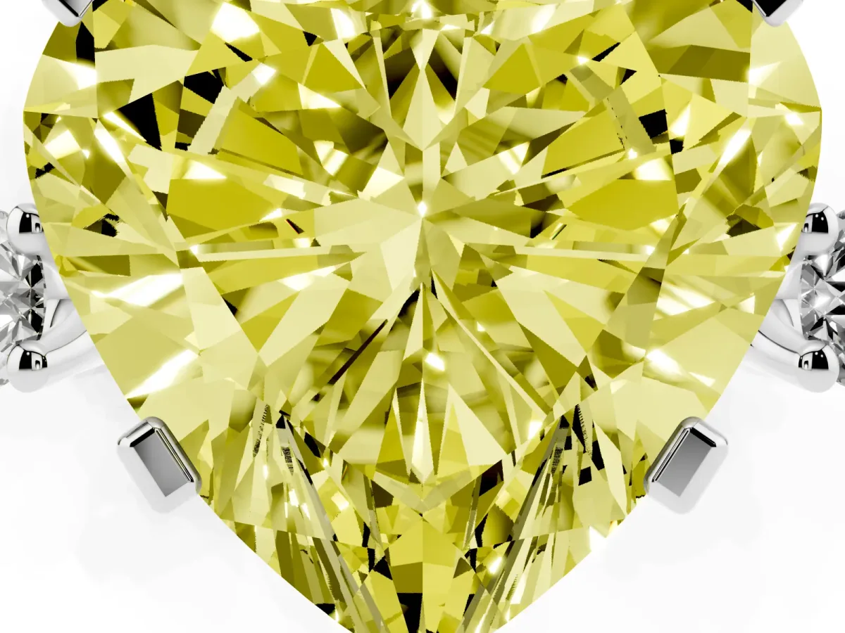 Fancy Yellow Heart Cut Cut Three-Stone Solitaire Ring with Round Accent Diamonds and Four-Prong Setting Silver