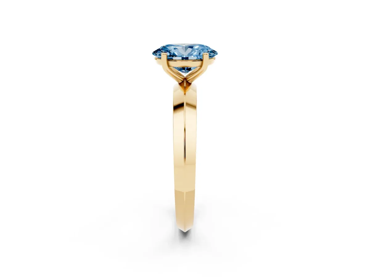 Fancy Blue Oval Cut Cut Solitaire Engagement Ring with Flat Band and Four-Prong Setting Yellow gold