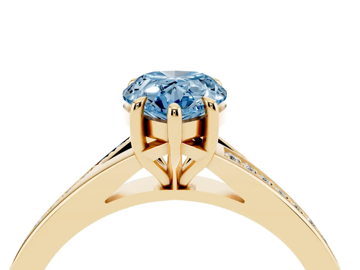 Fancy Blue Pear Cut Diamond Solitaire Ring with Pavé Band and Prong Setting Yellow gold