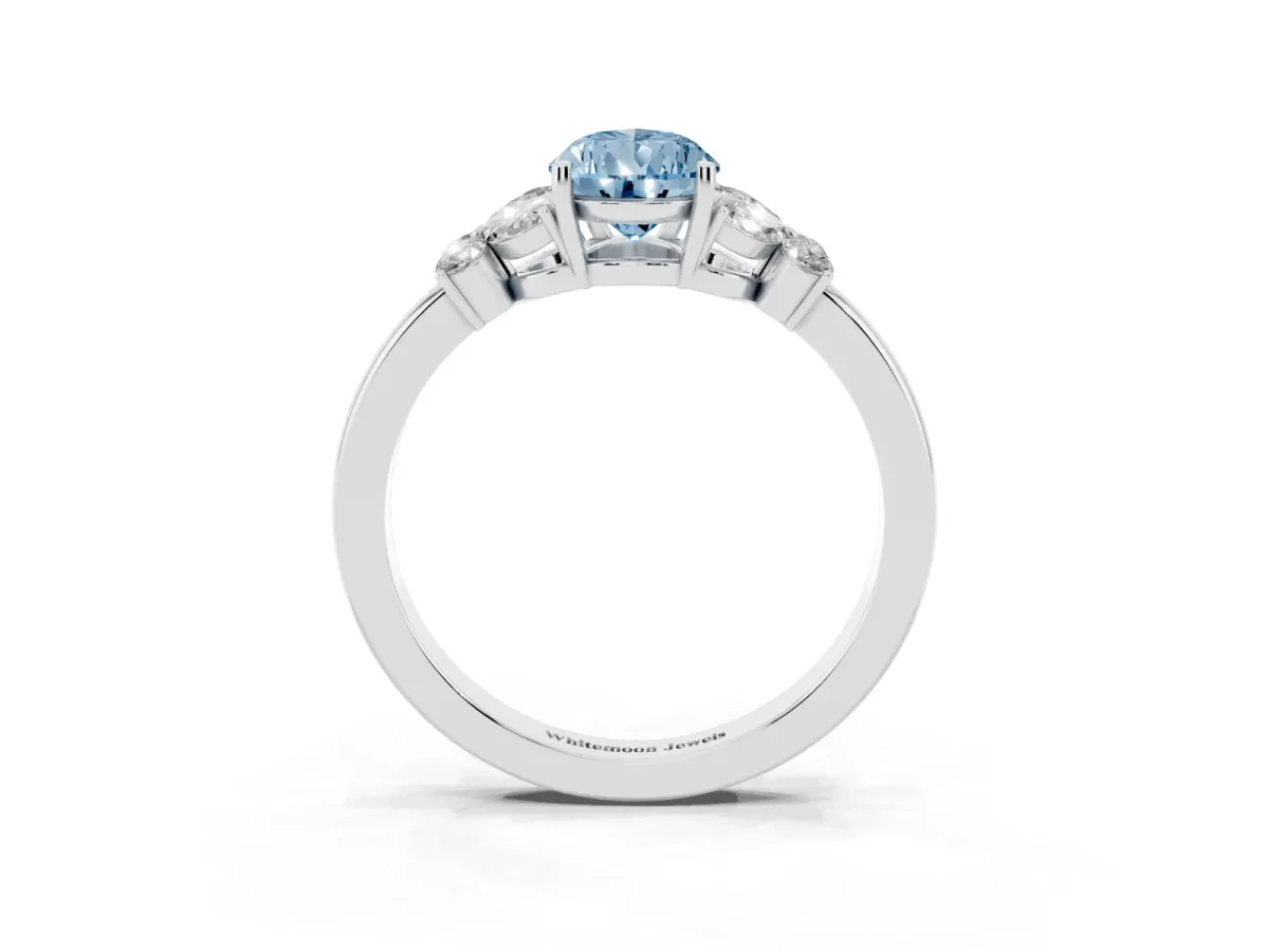 Fancy Blue Pear Cut Cut Solitaire Floral Diamond Ring with Four-Prong Setting Platinum