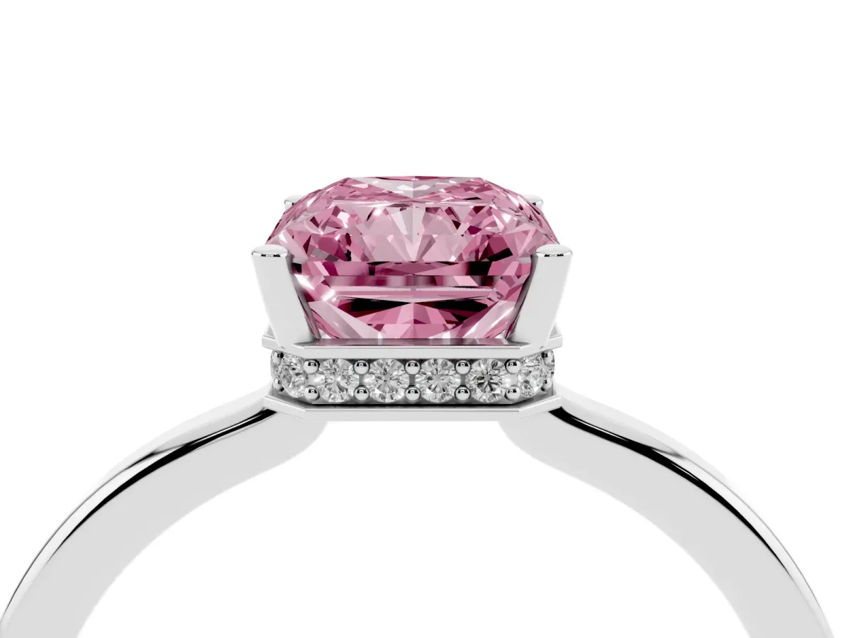 Fancy Pink Radiant Cut Cut Solitaire Engagement Ring with Four-Prong Setting on a Classic Band Silver