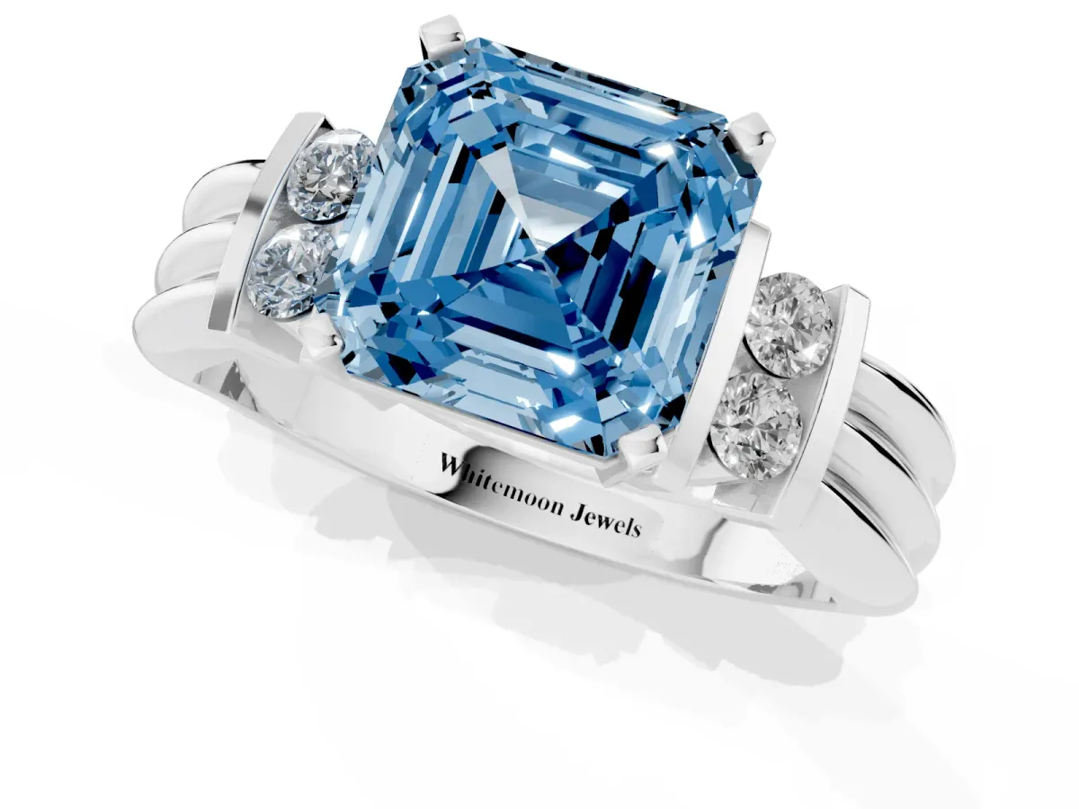 Fancy Blue Asscher Cut Cut Three-Stone Channel Set Ring with Bar Prongs Silver