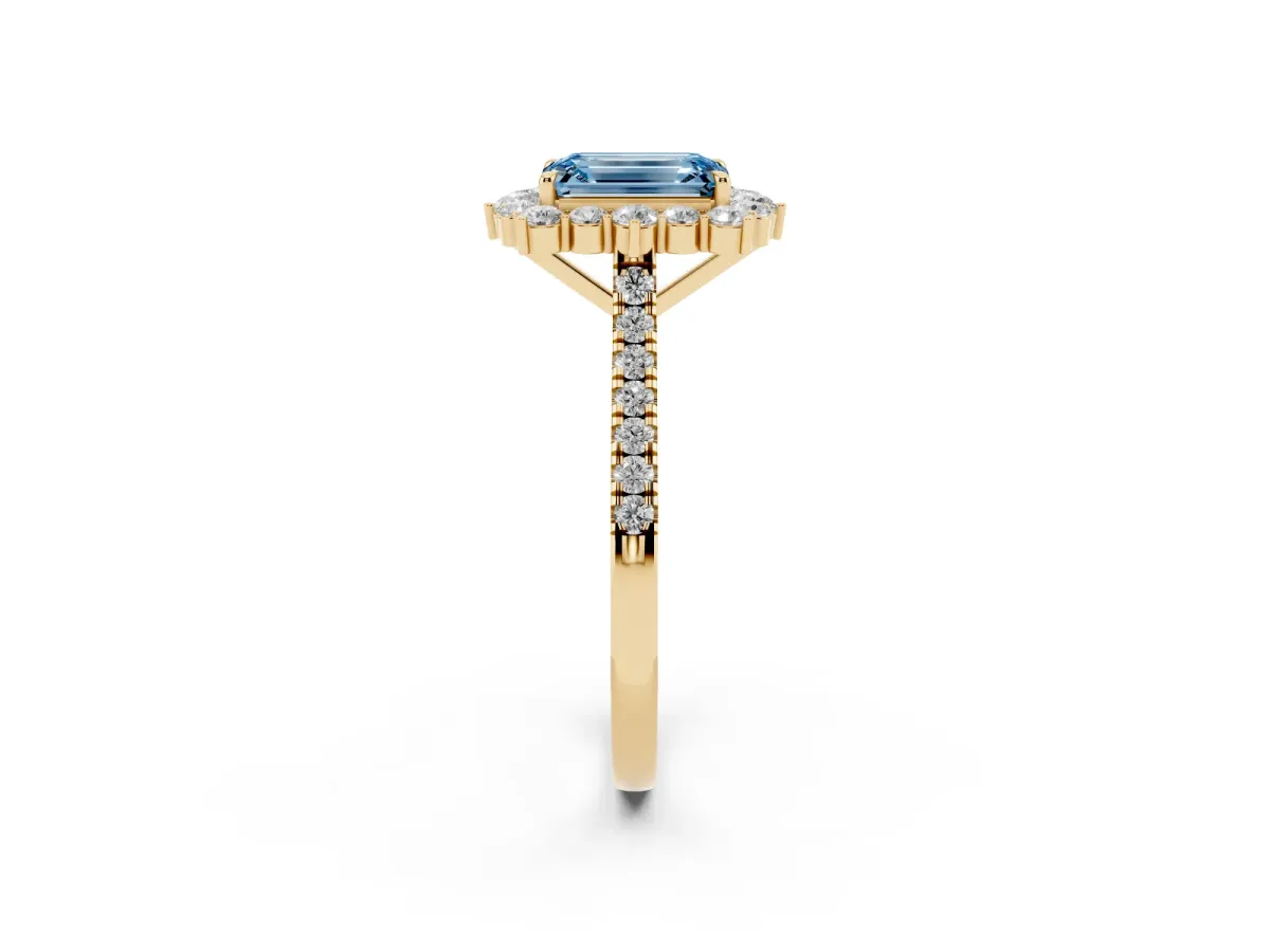 Fancy Blue Emerald Cut Halo Diamond Ring with Pavé Band and Prong Setting Yellow gold