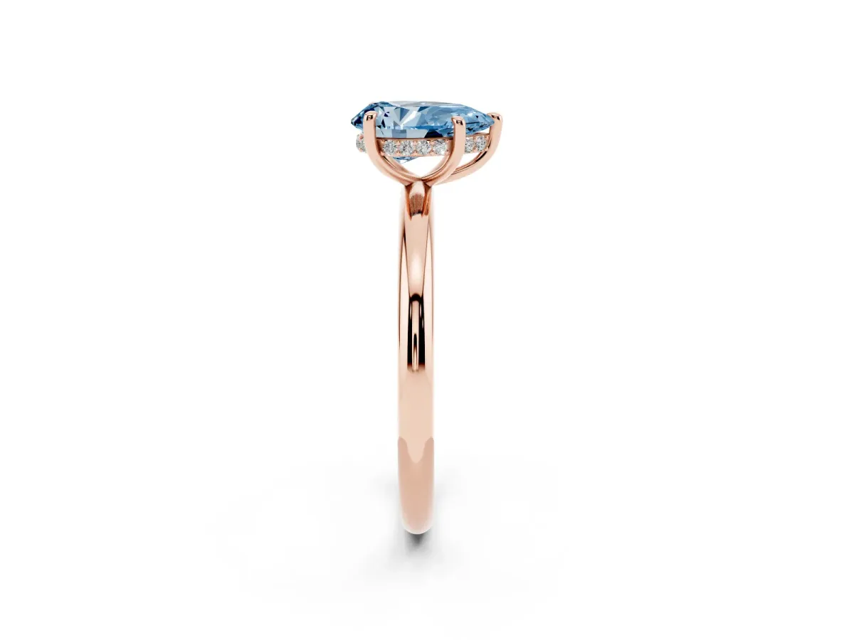 Fancy Blue Pear Cut Diamond Solitaire Ring with Thin Band and Four-Prong Setting Rose gold