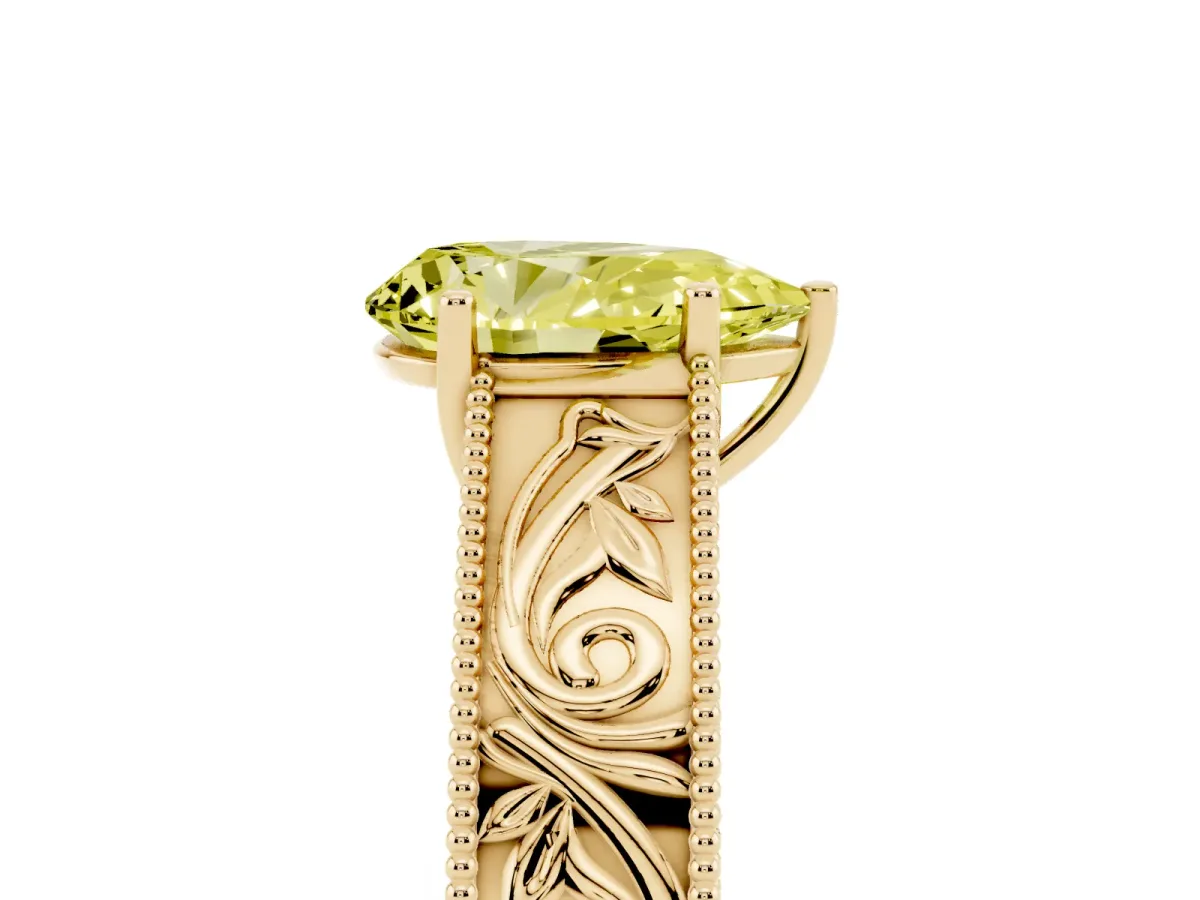 Fancy Yellow Pear Cut Diamond Solitaire Ring with Engraved Band and Four-Prong Setting Yellow gold