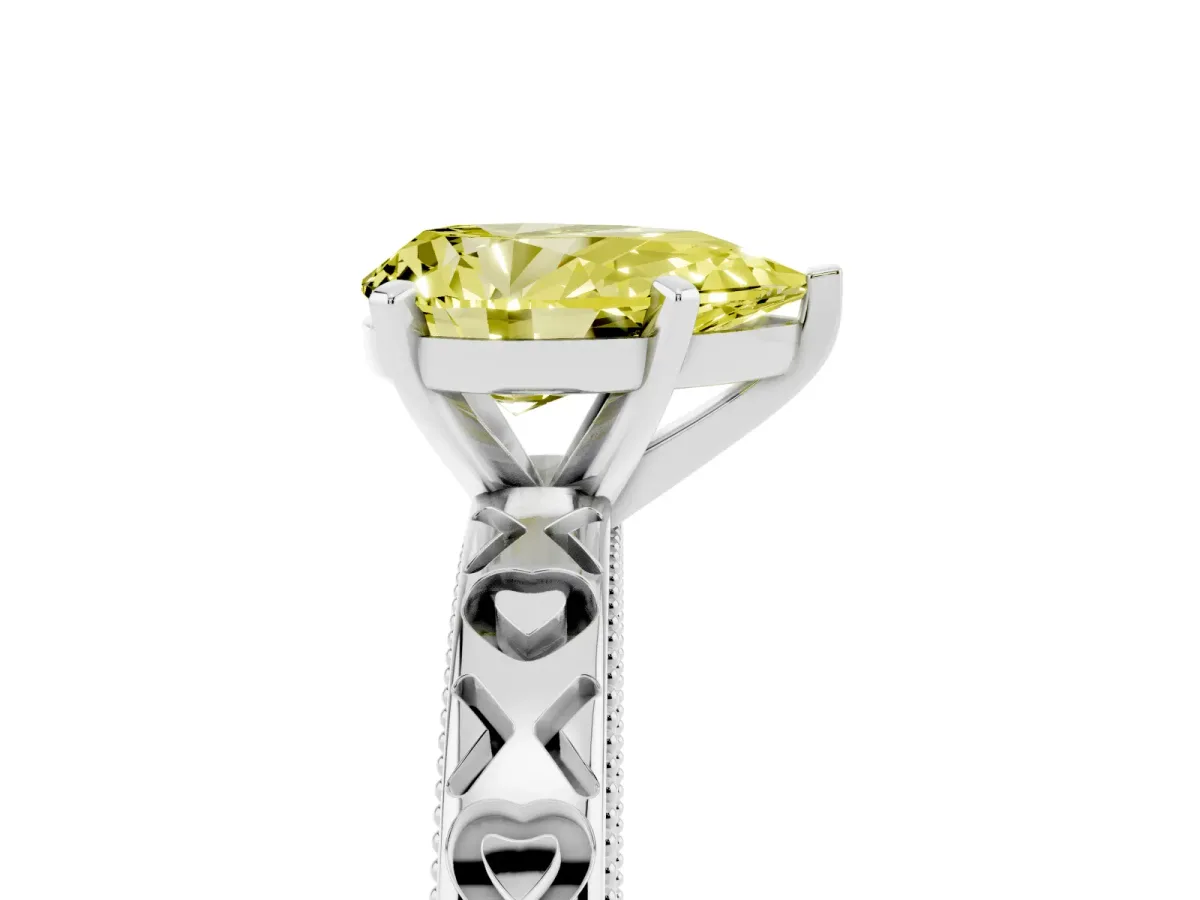 Fancy Yellow Pear Cut Solitaire Diamond Engagement Ring with XO Engraved Band and Four-Prong Setting Silver