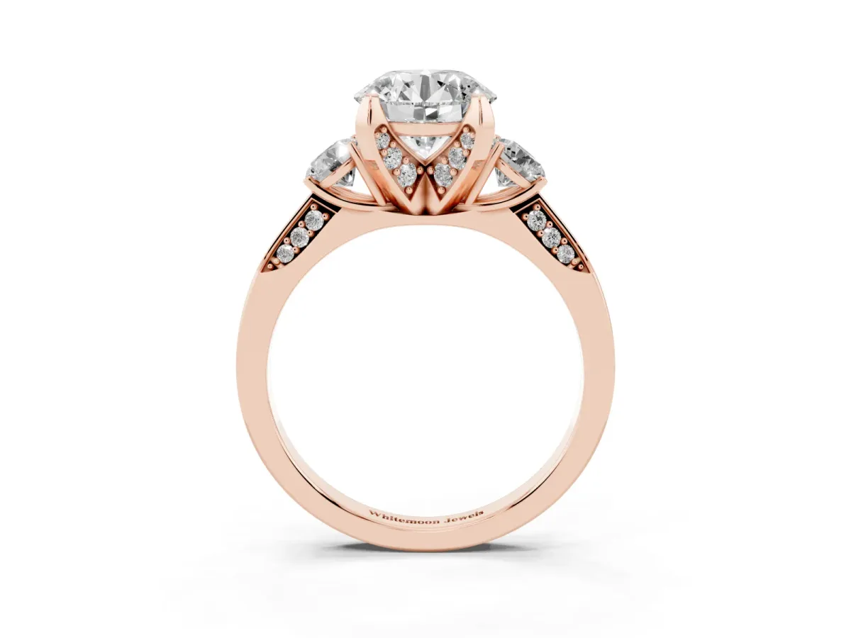 Round Cut Brilliant Three-Stone Diamond Ring with Pavé Band and Four-Prong Setting Rose gold